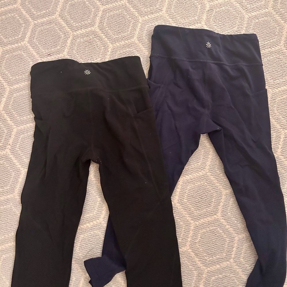 Athleta Girl high rise stash your treasure capri leggings in black & navy (12/L)